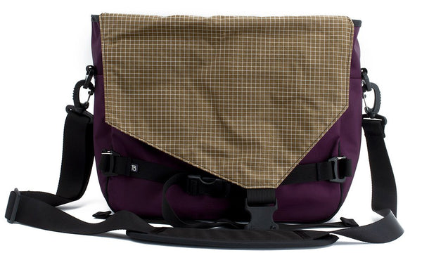 The Maker's Bag in Aubergine (dark purple) 525 Ballistic with a Coyote (brown with white grid) 200 Halcyon interior.